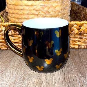 Disney Black and Gold Mickey Icon Mug with gold handle. 14 oz.